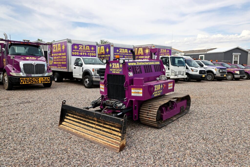 Zia Factory Outlet installation equipment and trucks
